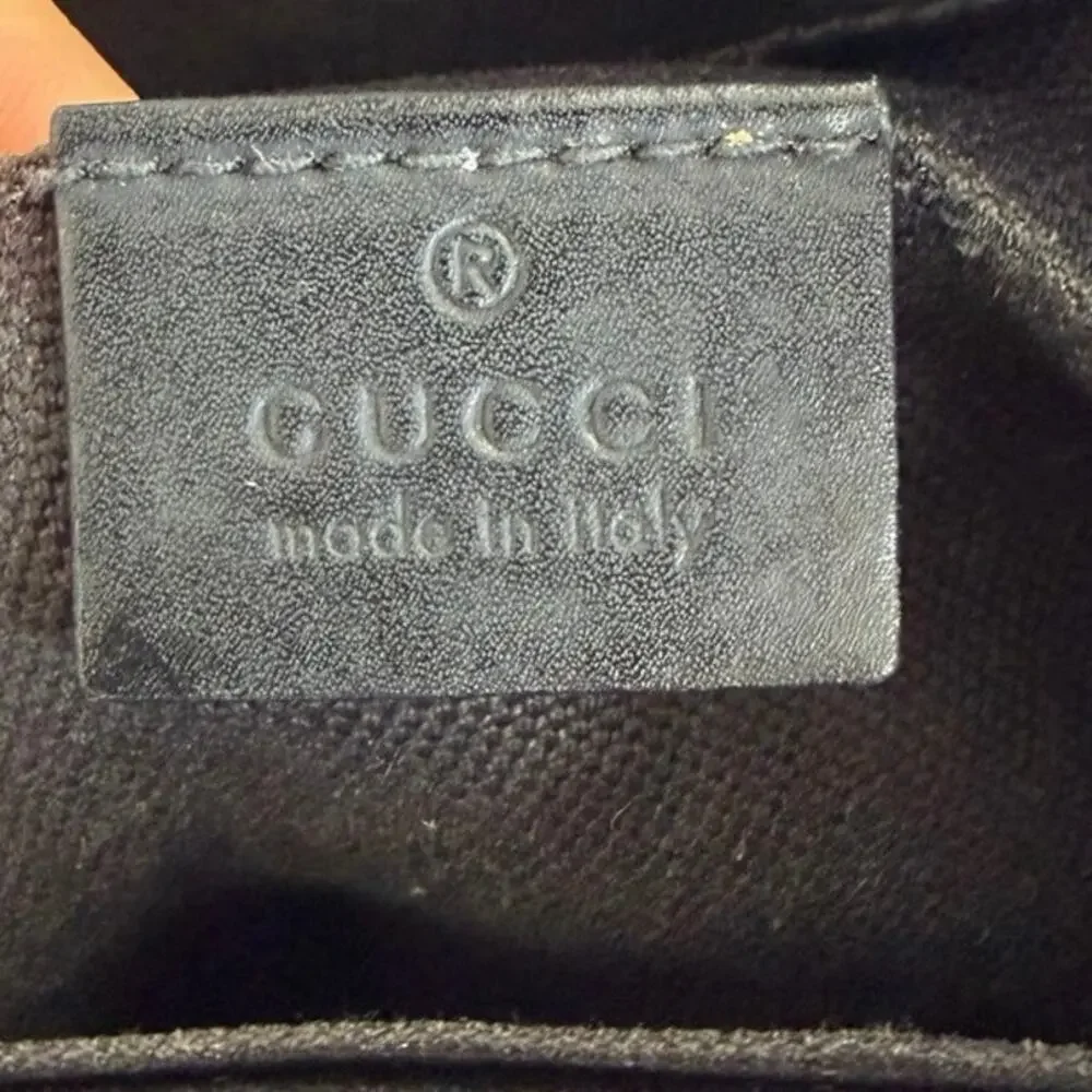 Gucci GG Monogram Small Messenger bag